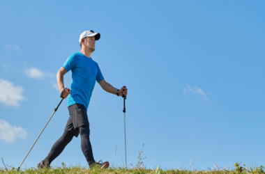 person walking with activator poles