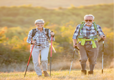 2 people walking with activator poles
